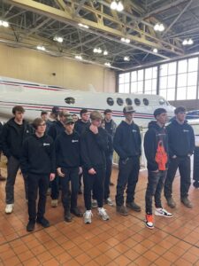 Students at BAVTS Visit to Scott Richards Aviation with VelocityR Aviation - in front of aircraft