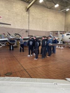 Students at BAVTS Visit to Scott Richards Aviation with VelocityR Aviation - in hanger looking at aircrafts - 2