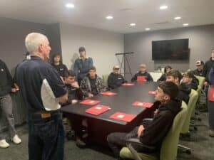 Students at BAVTS Visit to Scott Richards Aviation with VelocityR Aviation - in conference room listening to Mark Cronin - 2