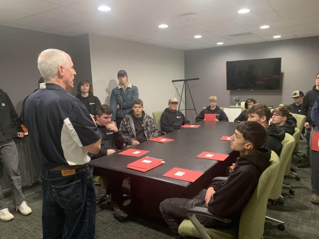 Students at BAVTS Visit to Scott Richards Aviation with VelocityR Aviation - in conference room listening to Mark Cronin
