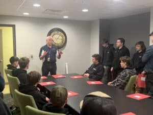 Students at BAVTS Visit to Scott Richards Aviation with VelocityR Aviation - in conference room listening to Mark Cronin - 4